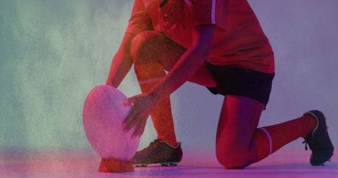 Confetti Celebrating Female Rugby Player with Ball on Field