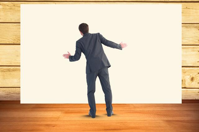 Full length of businessman against blank bill board - Download Free Stock Photos Pikwizard.com