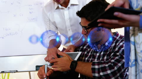 Innovative Team Collaborates in Meeting with Digital Interface Projections