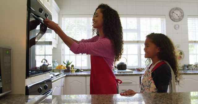 Young Biracial Woman Cooking in Home Kitchen, Learning Family Recipes with Copy Space - Download Free Stock Images Pikwizard.com