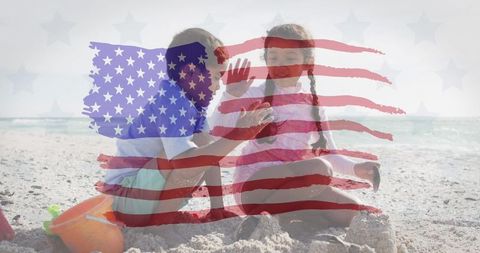 Children Playing On Beach With USA Flag Overlay Sandcastle Fun