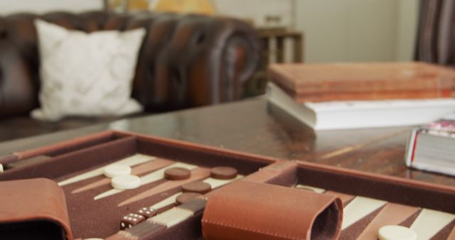 Close-Up of Backgammon Game on Wooden Table in Cozy Living Room - Download Free Stock Images Pikwizard.com