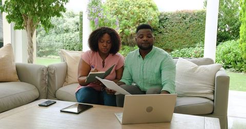 African American Couple Collaborating on Home Finances
