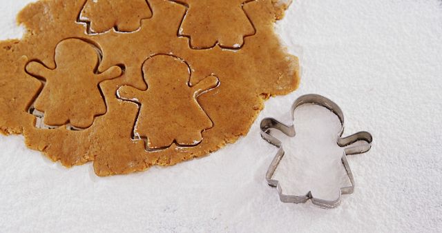 Gingerbread cookie dough with gingerbread man and accessories cutters - Download Free Stock Images Pikwizard.com