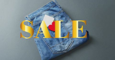 Denim Trouser Sale with Red Heart Tag on Grey Background