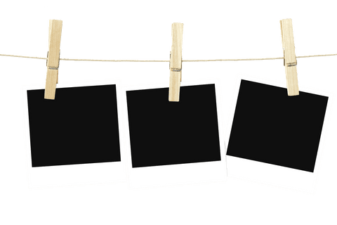 Hanging blank photos on transparent background photography concept