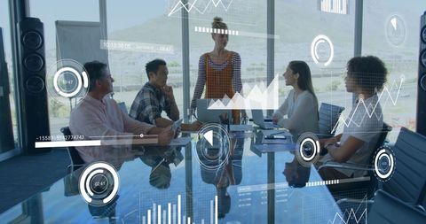 Diverse team in office with data technology interface