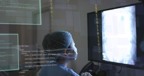 Healthcare professional analyzing x-ray on futuristic digital interface