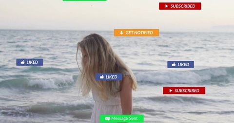 Woman standing at shoreline sending social post with floating liked subscribed message banners