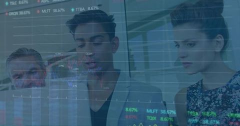 Three analysts reviewing market charts on glass screen, collaborating on trading analytics