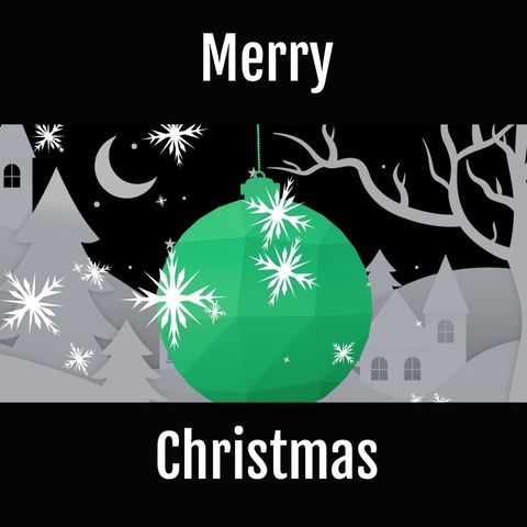 Festive christmas bauble with snowy winter scene and merry wishes