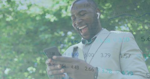 Digital Finance: Man Analyzing Mobile Stocks Outdoors