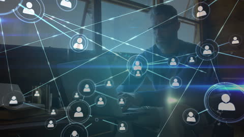 Caucasian Man Analyzing Digital Network on Laptop in Modern Office