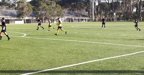 Soccer Players Practicing and Building Team Coordination Skills