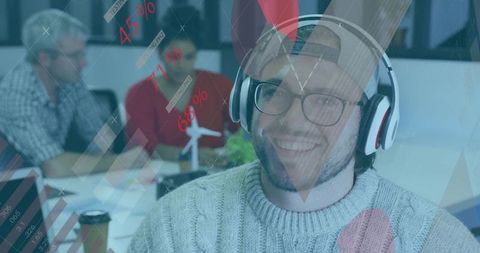 Animated data overlay visualizing team metrics on smiling man wearing headphones at desk