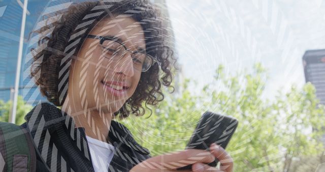 Smiling Teenager Using Smartphone Outdoors in Urban Area - Download Free Stock Images Pikwizard.com