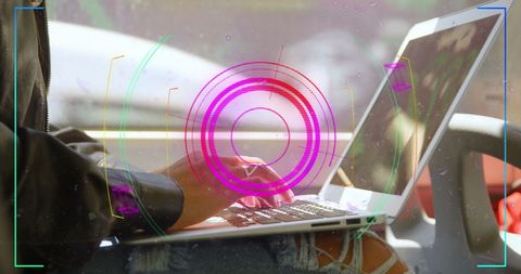 Digital Interface Overlay on Woman Using Laptop in Bus