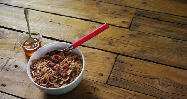 Healthy Breakfast Bowl with Granola and Honey on Wooden Table - Download Free Stock Images Pikwizard.com