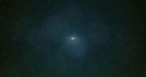 Bright Central Star with Majestic Glow in Star-Filled Galaxy