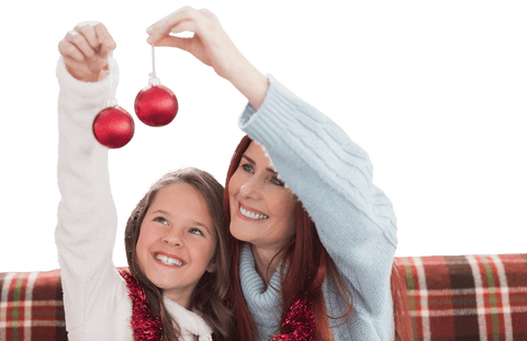 Cheerful mother and daughter holding baubles for christmas celebration