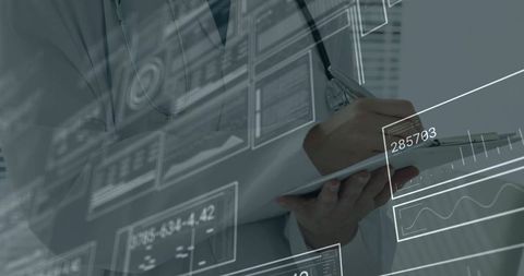 Female physician using clipboard with digital charts technology