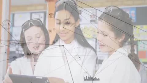 Girls Collaborating on Science Project Using Tablet Technology