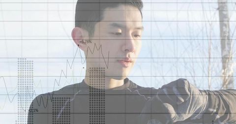 Urban athlete checking wearable fitness tracker with data and financial chart overlays