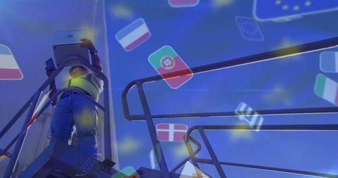 Technician fixing equipment amid european union flags