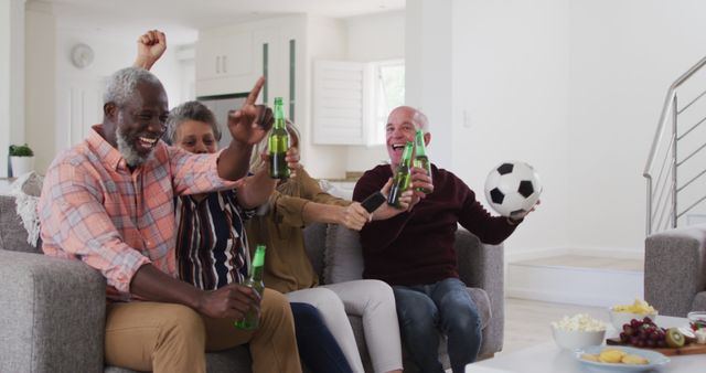 Senior Friends Enthusiastically Watching Soccer Game at Home - Download Free Stock Images Pikwizard.com