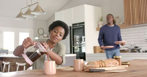 Couple Enjoying Cozy Morning Coffee Together in Modern Kitchen