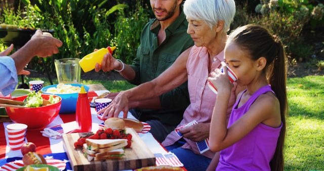 Multi-generational Family Enjoying Summer Picnic Outdoors - Download Free Stock Images Pikwizard.com