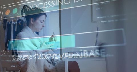 Woman in robe eating breakfast while coding on laptop in cozy minimal bedroom workspace