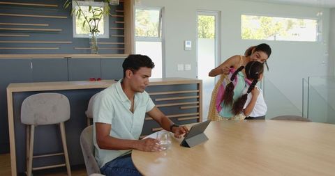 Family packing for school morning routine