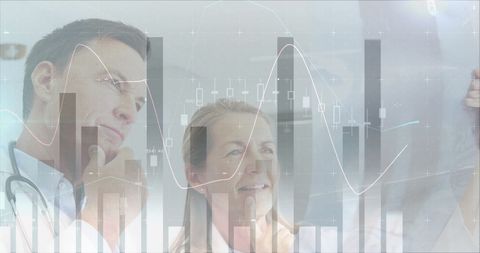 Medical professionals analyzing data with digital projection