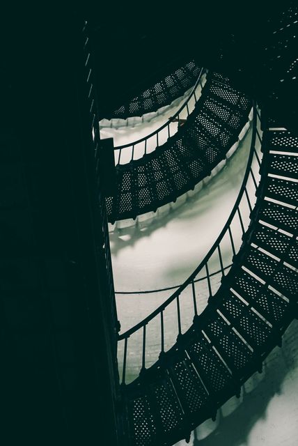 Elegant Curved Staircase with Black Iron Railing - Download Free Stock Images Pikwizard.com