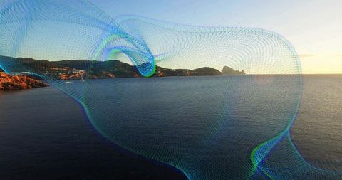Abstract Digital Mesh Flowing Over Seaside at Sunset