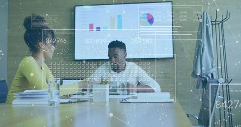 Colleagues Analyzing Data with Digital Interface Overlay in Office - Download Free Stock Images Pikwizard.com