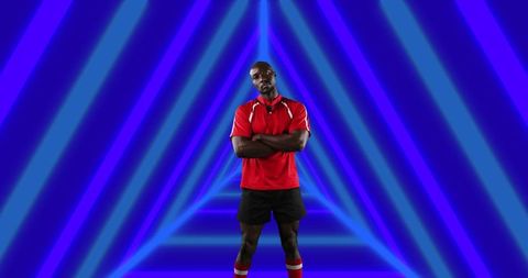 Confident Athlete Standing Against Futuristic Neon Lights