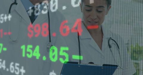 Clinician reviewing digital health analytics with stock market ticker overlay