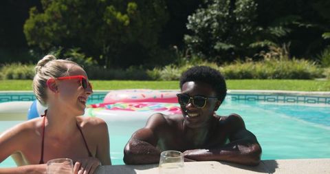 Friends Enjoying Relaxing Day at Backyard Pool