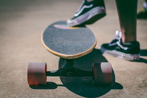Skater preparing for action outdoors
