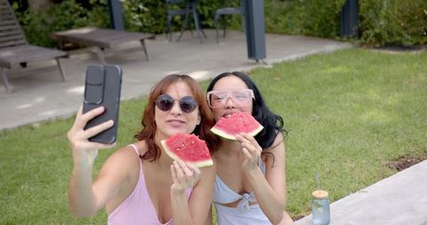 Cheerful Friends Enjoying Watermelon and Selfies in Summer