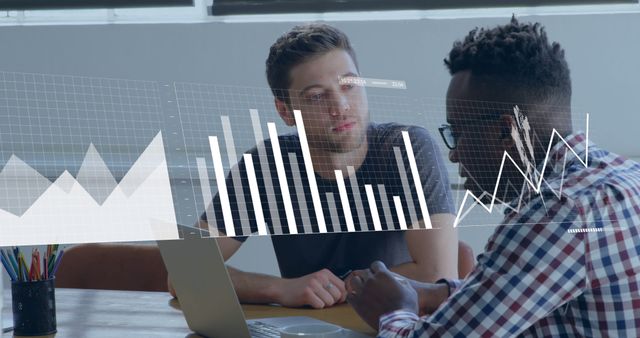 Colleagues Discussing Data Charts on Laptop in Office - Download Free Stock Images Pikwizard.com