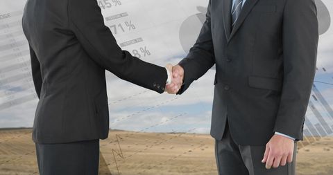 Business Partnership with Graphs Illustrating Collaborative Success - Download Free Stock Images Pikwizard.com