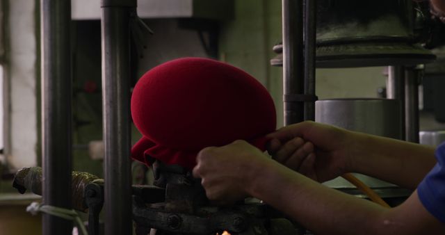 Craftsman Shaping Red Felt Hat in Workshop - Download Free Stock Images Pikwizard.com