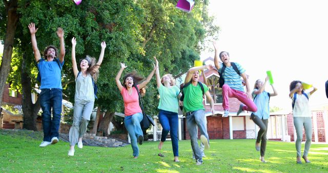 University students celebrating graduation by tossing caps outdoors - Download Free Stock Images Pikwizard.com