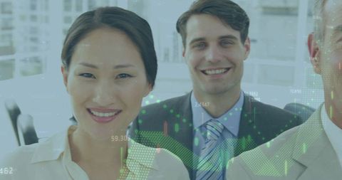 Smiling corporate team wearing suits with holographic finance data overlay