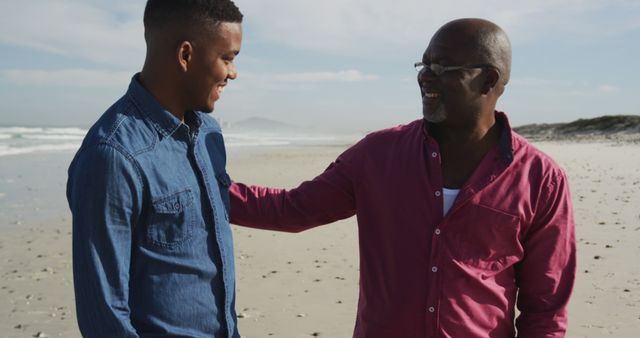 Father and Son Enjoying Time Together on Beach - Download Free Stock Images Pikwizard.com