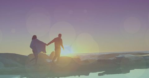 Happy Couple Walking at Sunset on Beach - Download Free Stock Images Pikwizard.com