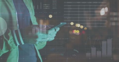 Man Analyzing Financial Data on Smartphone in Urban Night - Download Free Stock Images Pikwizard.com